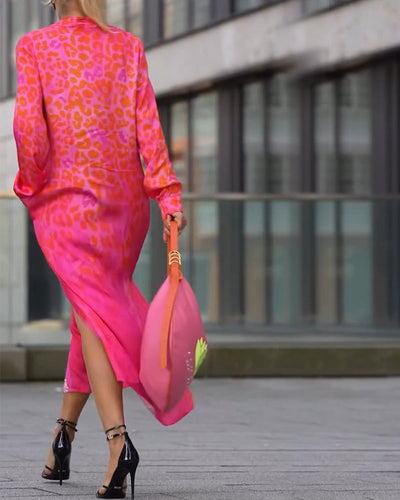 Long-sleeved dress with a leopard print slit